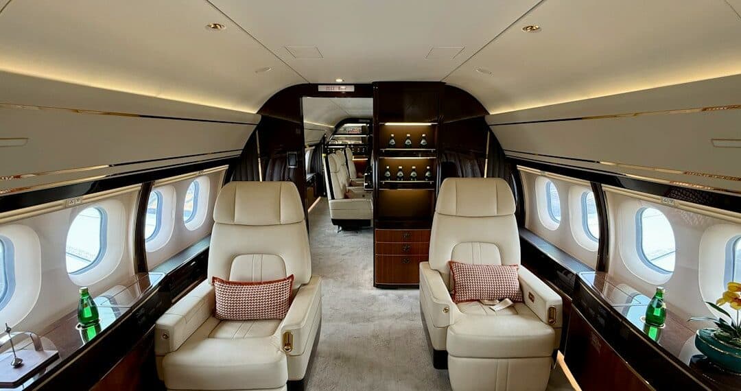 Luxurious private jet interior with bespoke leather seating — Hype Luxury